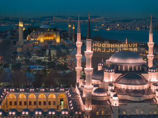 Blue Mosque (Sultanahmet Camii) Illuminated Letters Between Ramadan Month Minarets (Mahya) Drone...