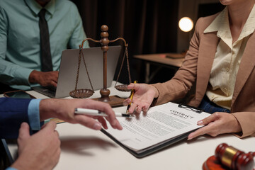 A lawyer or legal advisor is reading the statute of limitations. Clarifying details of legal...