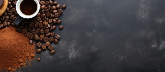 Coffee beans and powder on dark background - obrazy, fototapety, plakaty