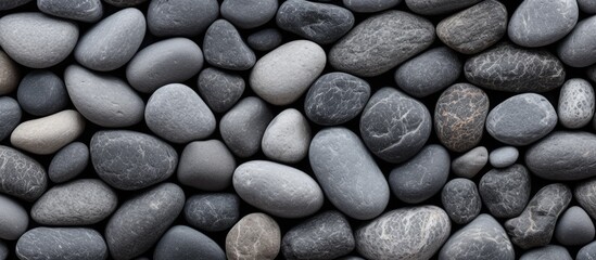 Fototapeta na wymiar Serenity in Nature: A Tranquil Pile of Weathered Grey Rocks Amidst a Calm Afternoon