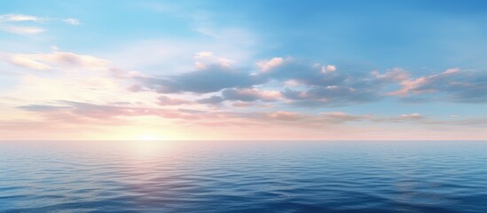 Obraz premium A serene sunset sky over the sea