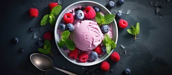 Fototapeta na wymiar A bowl of creamy ice cream with fresh raspberries