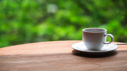 Cup of coffee on wood background. Copy space. Top view. Flat lay. Panorama