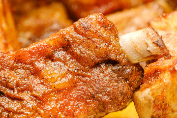 baked pork ribs with bone close-up