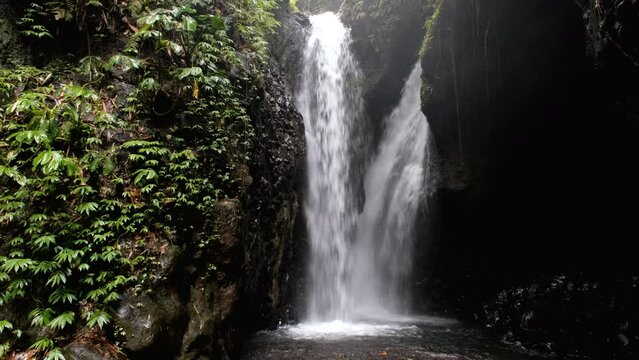 Tripod shot of Git Git waterfall on cloudy day. Gitgit, Bali, Indonesia.