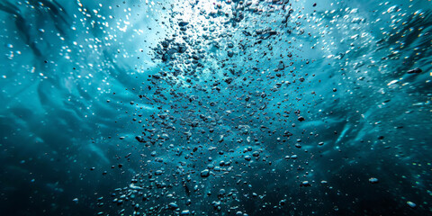 close up air bubbles in  water ocean, underwater photography water in natural light, blue and teal enderwater 