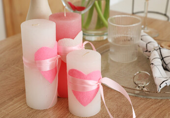 pink candles with hearts 