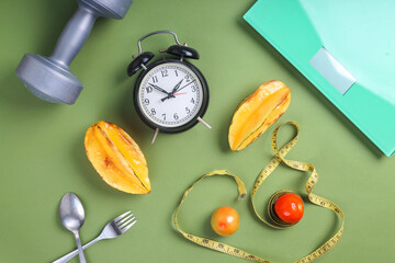 Diet concept. Weight Scale, Measuring Tape, Fruits and Dumbbell for Dietary and Loosing Weight.