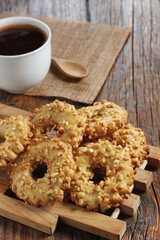 Cookies rings with nuts and coffee