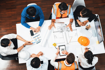 Top view banner of diverse group of civil engineer and client working together on architectural...