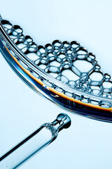 A close-up photo of water droplets that can be used in science, medicine, ingredients, and beauty designs.