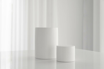 Set of white cylinder pedestal podium on white table background