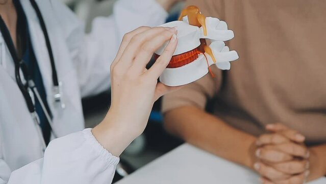 Doctor with human Pancreatitis anatomy model with Pancreas, Gallbladder, Bile Duct, Duodenum, Small intestine. Pancreatic cancer, Acute and Chronic pancreatitis, Digestive system and Health concept