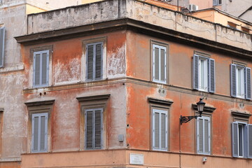 Fototapeta na wymiar Via della Seggiola Street Corner Building Facade in Rome, Italy
