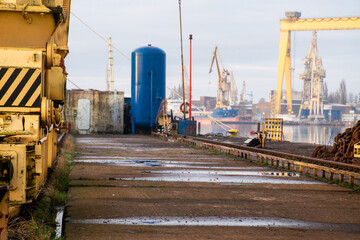 the quay of the ship repair yard including cranes - 762084432