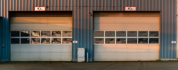Garage door in an industrial building - 762084861