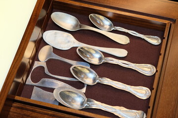 Silverware with engraving in the workshop.