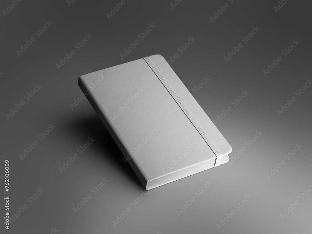 Poster Mockup of a textured white closed notebook with an elastic band, diary with a hard cover, isolated on a background with dark shadows.