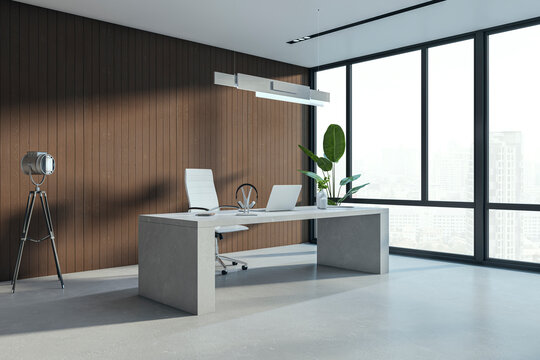 Clean office interior with decorative wooden wall and panoramic window with city view. 3D Rendering.