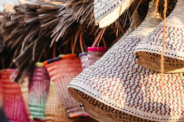 Weaved traditional Emirati handicraft from dried palm leaves at the market in Abu Dhabi