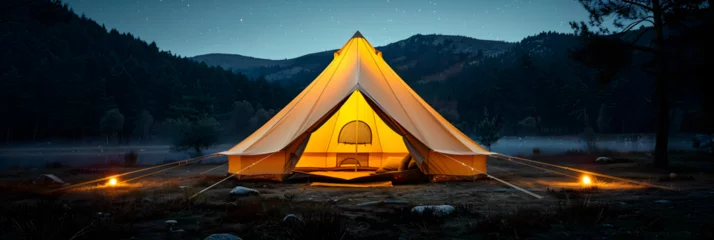 Fotobehang Glamping. Illuminated bell tent at night, Nature light travel canvas camping glamping luxury forest tent vacation © sanjaykhan
