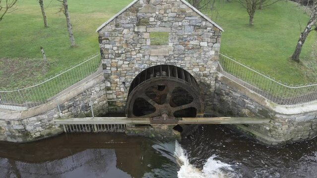 Historic waterwheel at Ballinode in Monaghan, Ireland generating eco-friendly power
