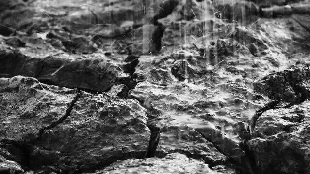 Dry cracked ground after drought light rain climate change environment