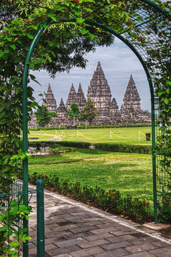 Beautiful Prambanan temple photo shot with natural green plant frame. Its famous place to visit Indonesia