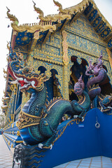 Naklejka premium Wat Rong Suea Ten or The Blue Temple is the most famous landmark, Chiang Rai, Thailand 