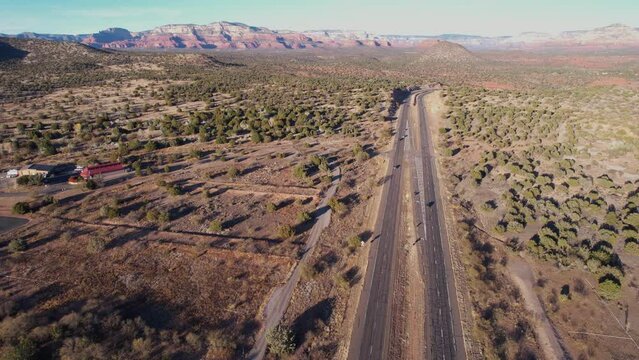 Aerial View of Traffic on Arizona State Route, Desert Road and Landscape, Drone Shot