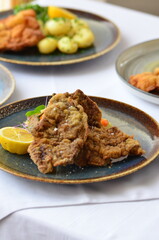 view of served veal steak from liver, Czech traditional food, restaurant background, close-up view