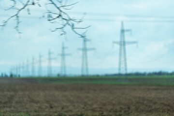 High voltage towers with sky background. Power line support with wires for electricity...