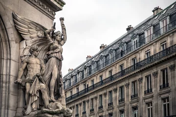 Fotobehang Exquisite French Statuary Adorning the Building Facade © Wallis Yu