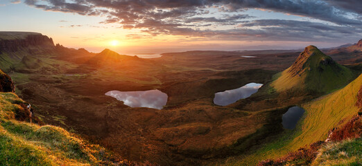 Mountain panorama landscape in Scotland, Quiraing at dramatic sunrise