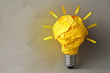 yellow scrap paper ball virtual lightbulb ideas concept