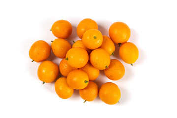ripe cumquat or kumquat fruit isolated on white background