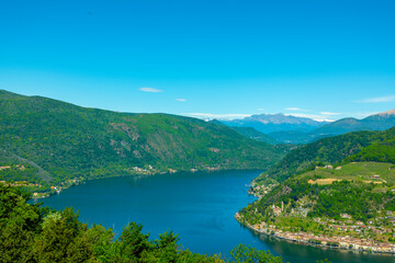 Obraz na płótnie Canvas Aerail View over Morcote with Alpine Lake Lugano and Mountain in a Sunny Day in Ticino, Switzerland.
