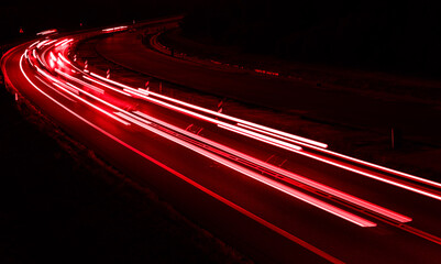 lights of cars driving at night. long exposure