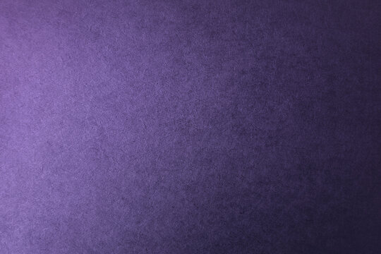 Classic midnight purple tone color paint on recycled environmental friendly cardboard box blank paper texture background with space minimal style