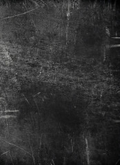 Grunge black scratched scary background, old film effect, dusty texture; empty space; wall banner; horizontal
