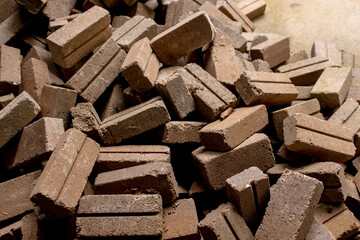 sun dried clay or mud bricks scattered at a work site in Malaysia