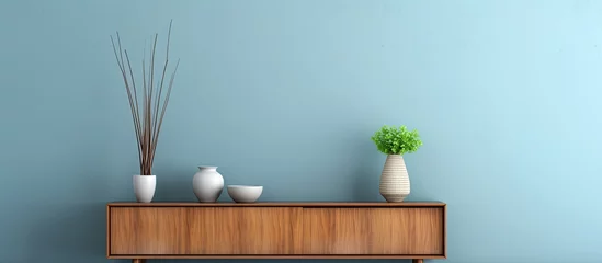Fototapeten A wooden dresser with plantfilled vases and flowerpots on top, set against a blue wall. This stylish interior design features a mix of wood, plants, and decorative elements in a rectangular shape © 2rogan
