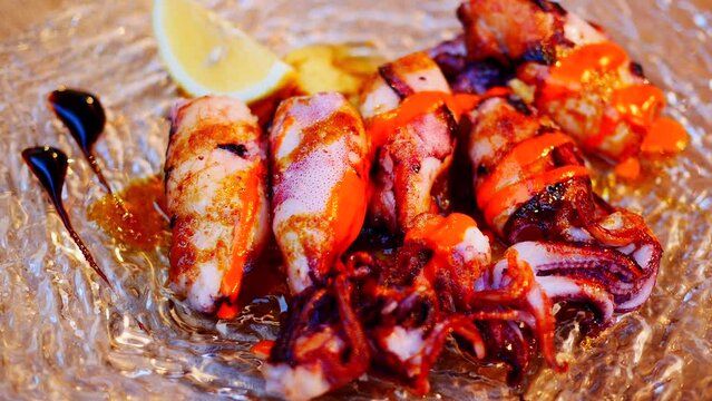 Chipirones, squid with garlic tapa in Spain
