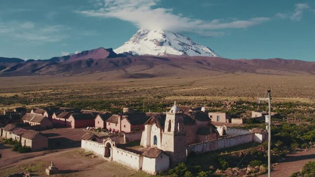 Church in Sajama and a Volcano