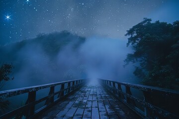 A bridge disappearing into mist with a starry night sky in the background