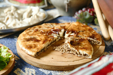 Savory Pizza on Wooden Cutting Board