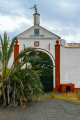 Centenary old Parador with a religious ceramic plaque in Andalusia, Spain
