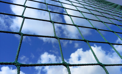 Football goal grid close up.