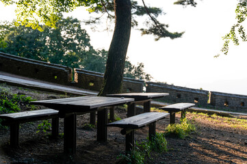 Fototapeta premium View of the tables and benches at the park