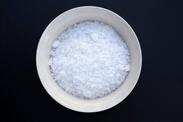 Sodium Hydroxide or NaOH, caustic soda